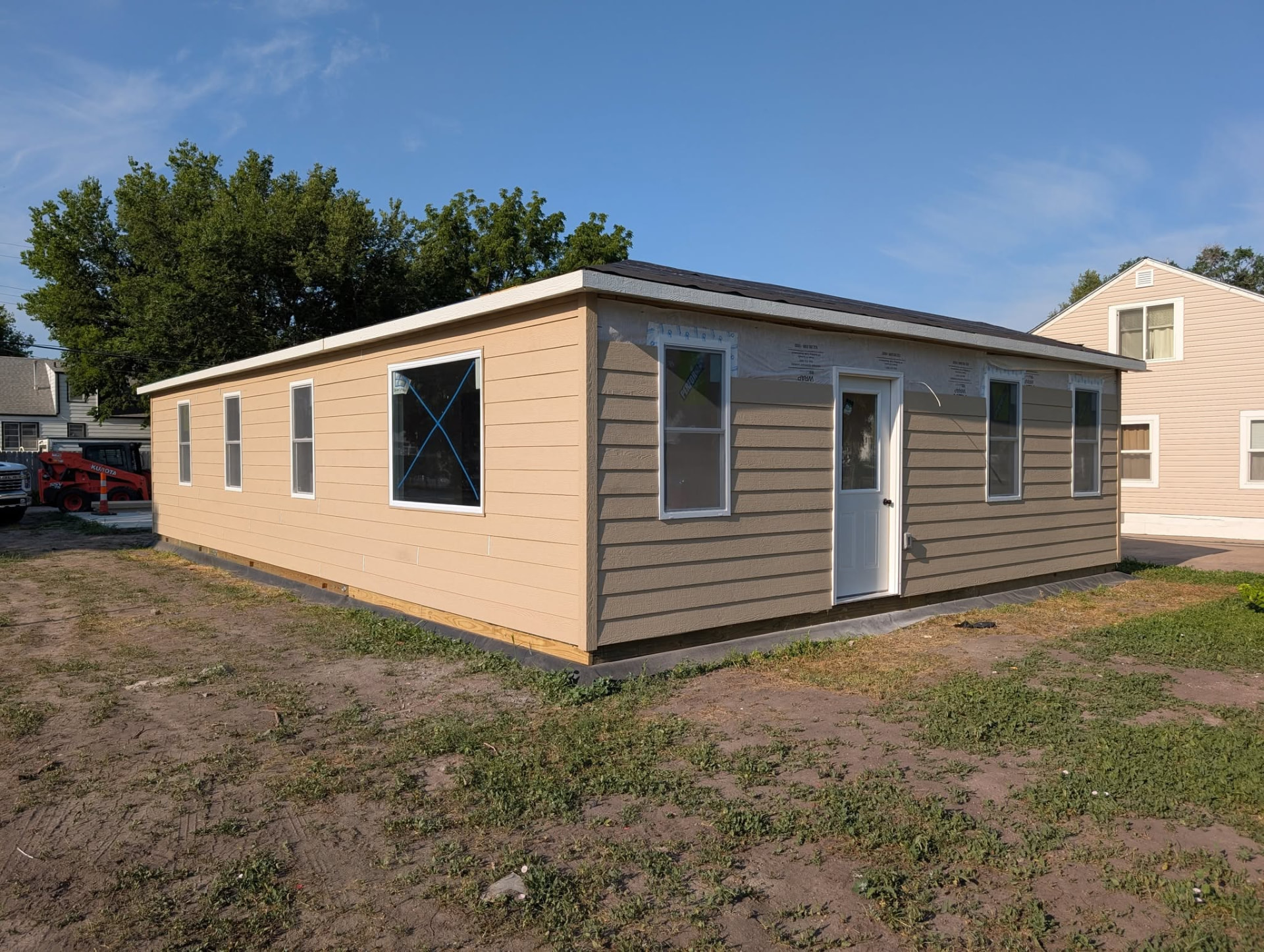 Siding installed on the tiny house exterior